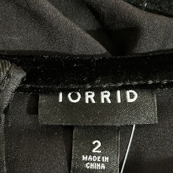 NWT TORRID Women’s Black Crepe Velvet Trim Asymmetrical Peplum Top Size 2X - Picture 10 of 12